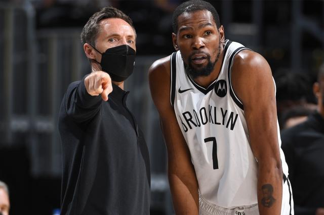 Steve-Nash-talks-with-Kevin-Durant-during-a-game-in-May..jpg